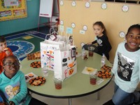 students eating snacks during the Halloween party