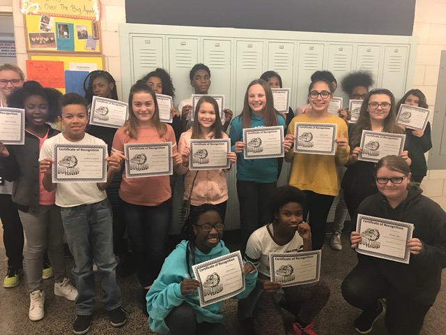 students with Honor Roll and Merit Roll certificates