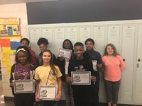 students with Honor Roll and Merit Roll certificates