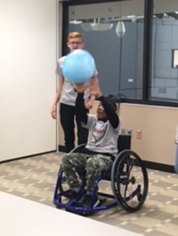 students with a wheelchair