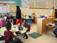 students eating their thanksgiving feast