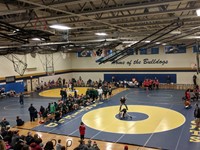 wrestling match in the middle of the floor