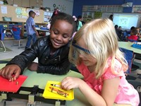 kindergarten students learning about science tools