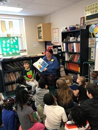 Parents reading to students during World Read Aloud Day