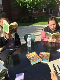 Reading in the Courtyard at Maple Leaf - May 2018