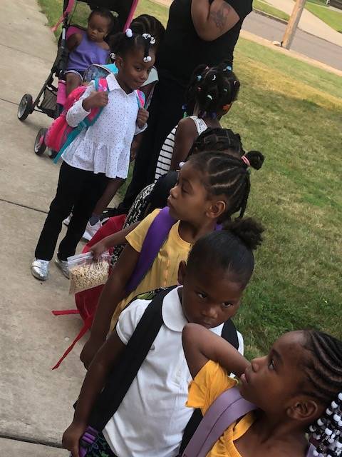 kindergarten girls line up to start school